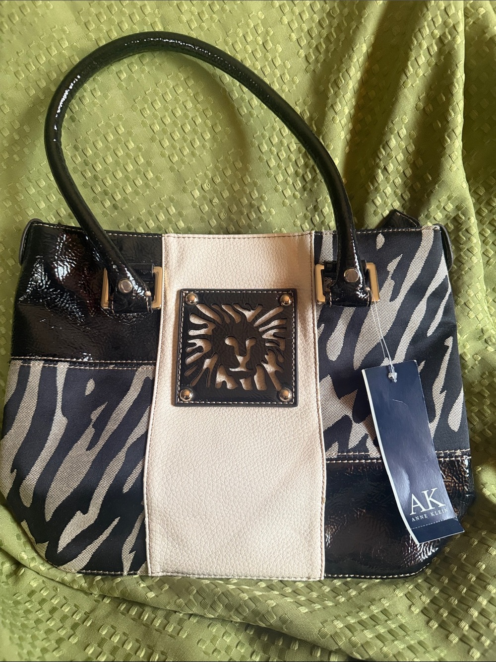 Anne Klein Black and Cream Zebra-Print Tote with Lion Emblem NWT